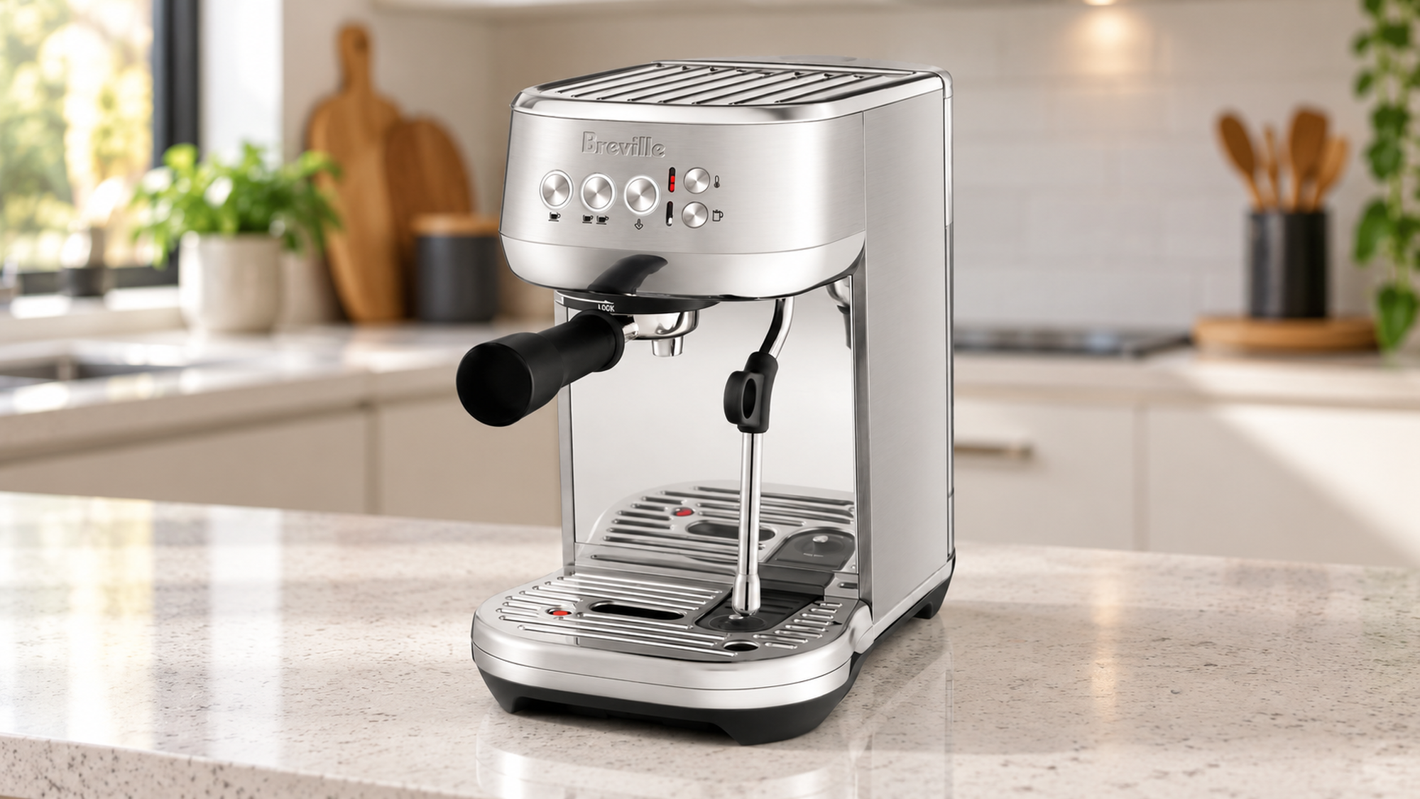 Breville stainless steel espresso coffee machine on a kitchen benchtop.