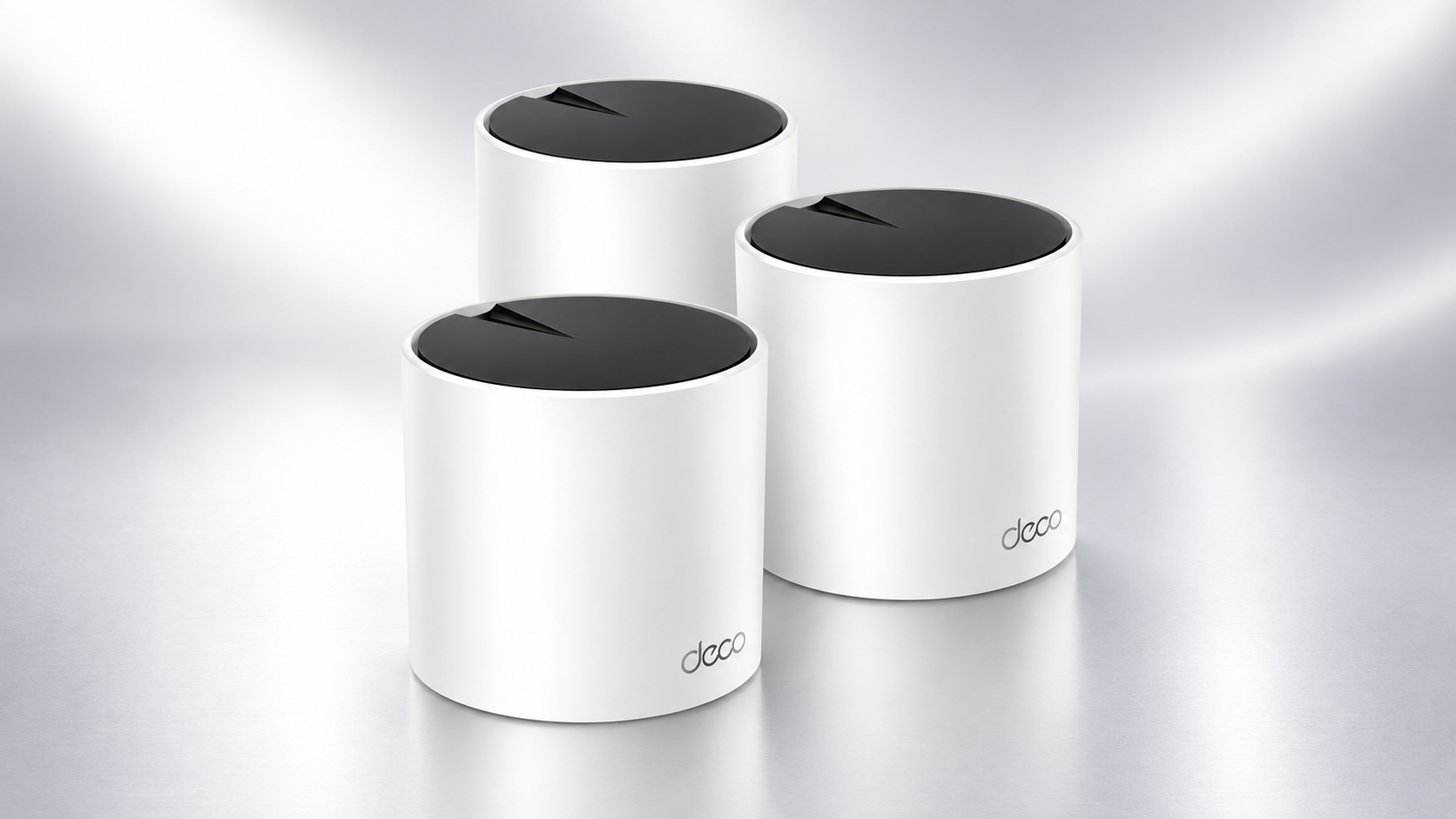 TP-Link Deco mesh WiFi three-pack on a clean silver and white background