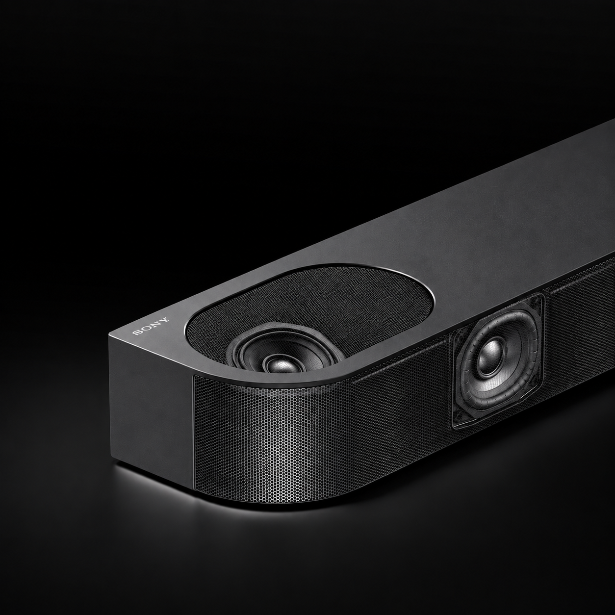 Sony Dolby Atmos soundbar with up-firing speakers on a black studio background, designed for immersive overhead surround sound.