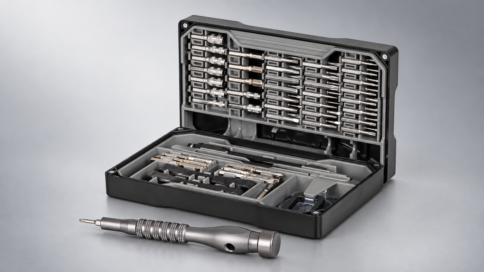 Precision screwdriver and bit set beside an open black storage case - Hand & Power Tools at Tech Supply Shed NZ