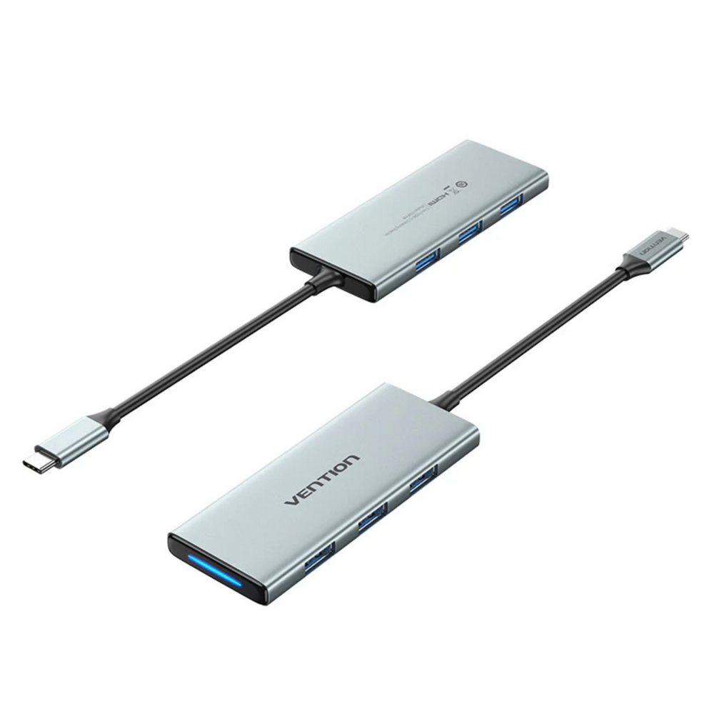 Gray aluminum USB-C docking station with HDMI and USB ports