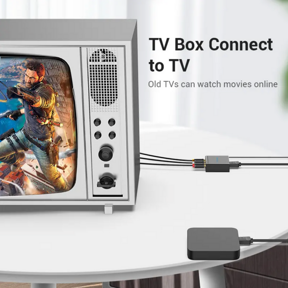 Black HDMI to RCA converter connected to a TV with HDMI and RCA cables