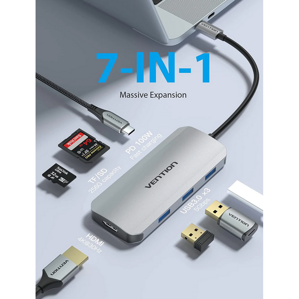 Silver USB-C dock with blue USB ports and card slot, compact multiport hub