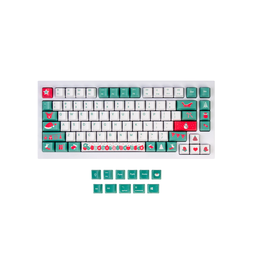Christmas keycap set on keyboard, white and teal caps with red symbols; spare keys shown