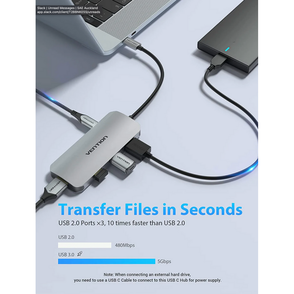 Silver USB-C docking station with multiple cables and stacked USB expansion ports