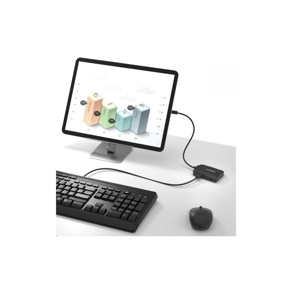 Mbeat USB-C hub connected to monitor and keyboard setup via cables