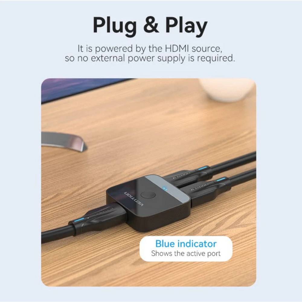 Black HDMI bi-directional switcher with blue active-port indicator on HDMI connection