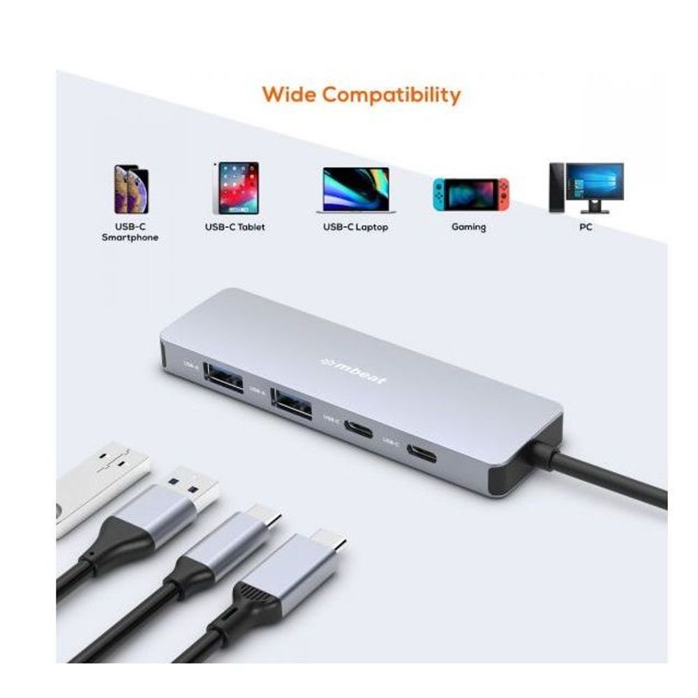 Grey 4-port USB-C hub with multiple device cables and port outputs