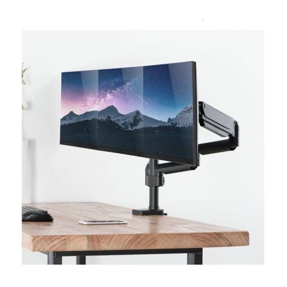 Triple monitor gas spring arm holding a widescreen monitor on a desk, black