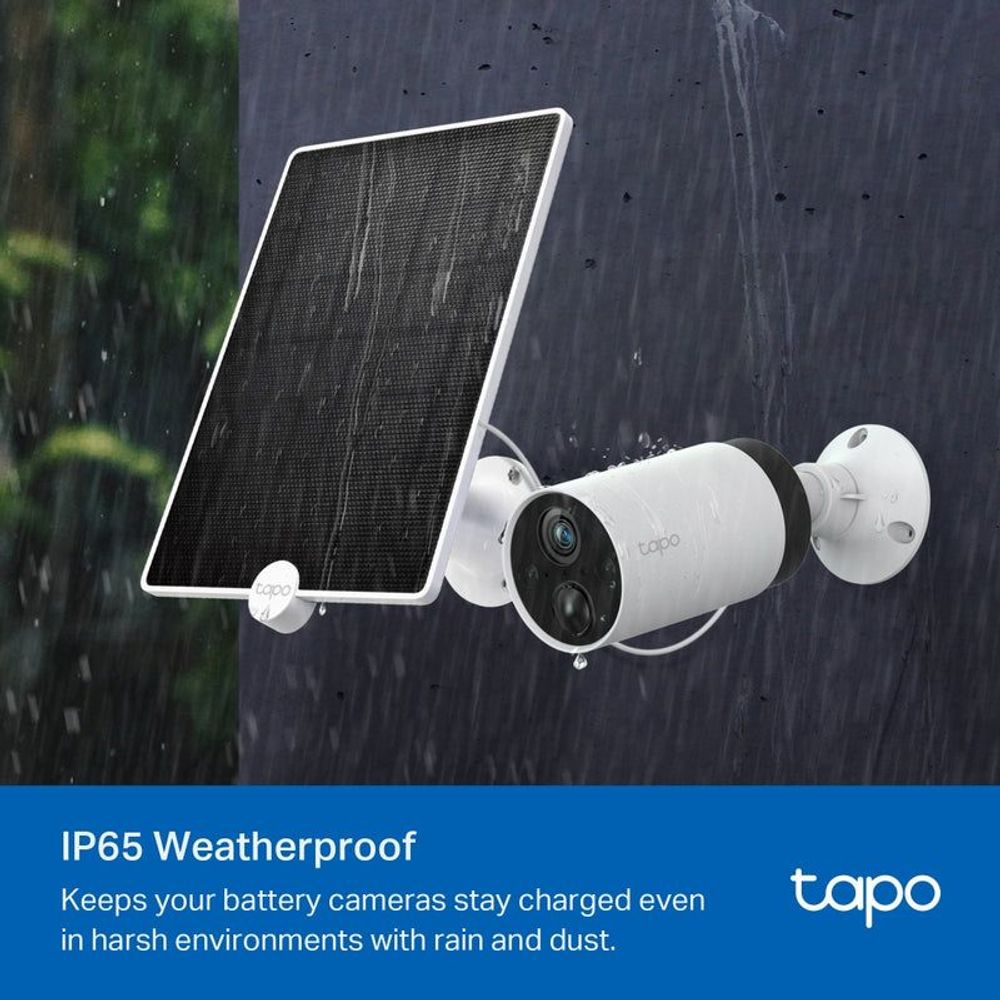 Black solar panel with white outdoor security camera mounted outdoors