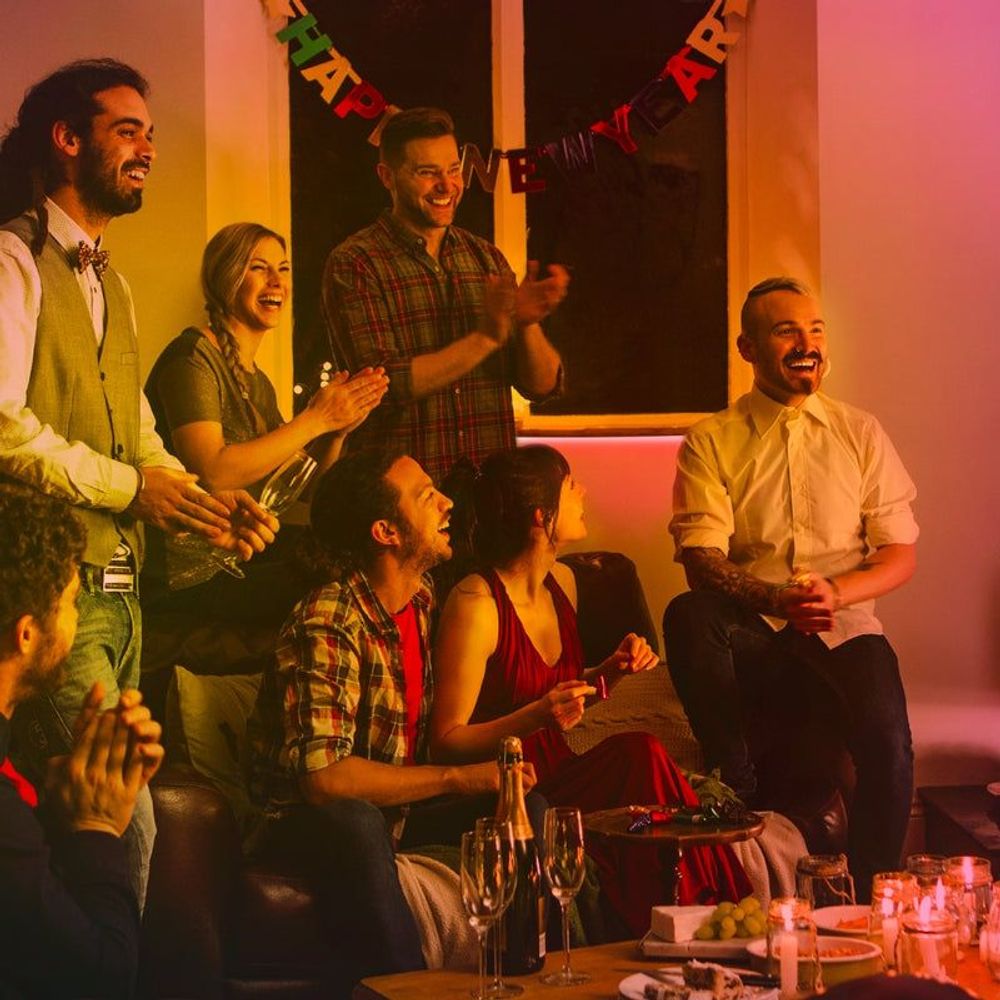 Smart Wi-Fi light strip adding colored lighting in a party room