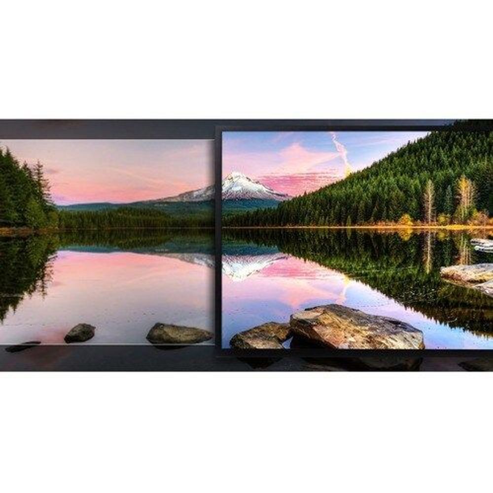 Samsung 32-inch 4K LCD monitor showing landscape reflection image, dark frame and stand