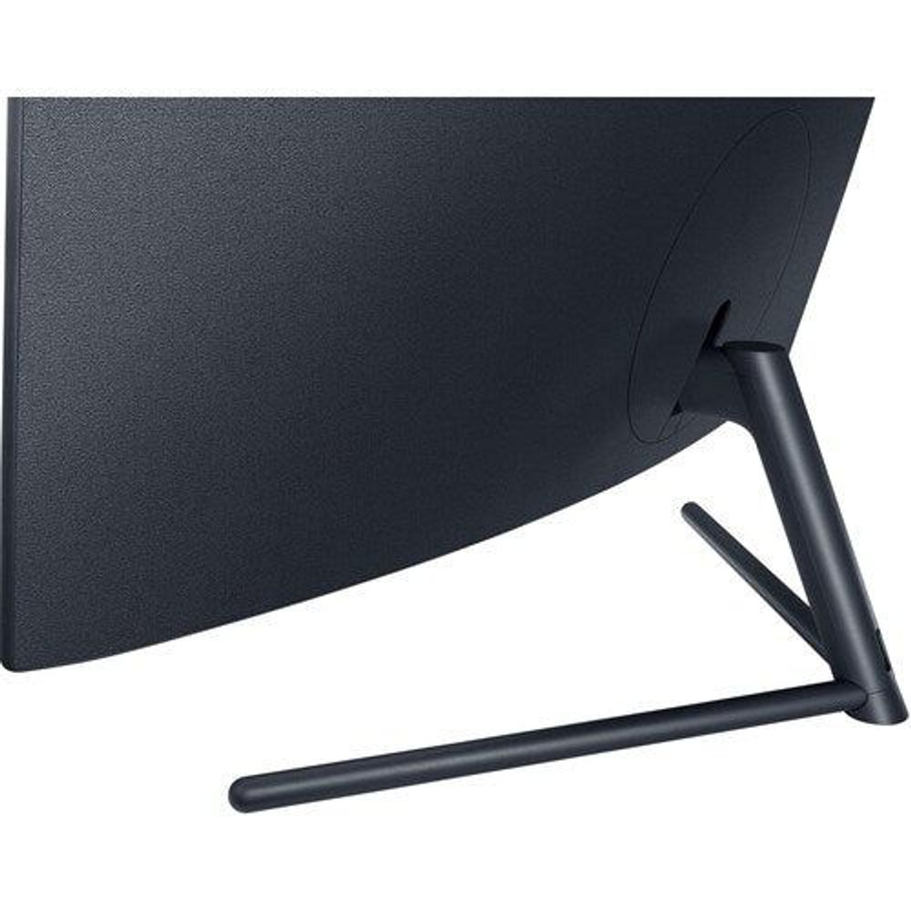 Curved monitor back close-up with dark textured finish and stand support