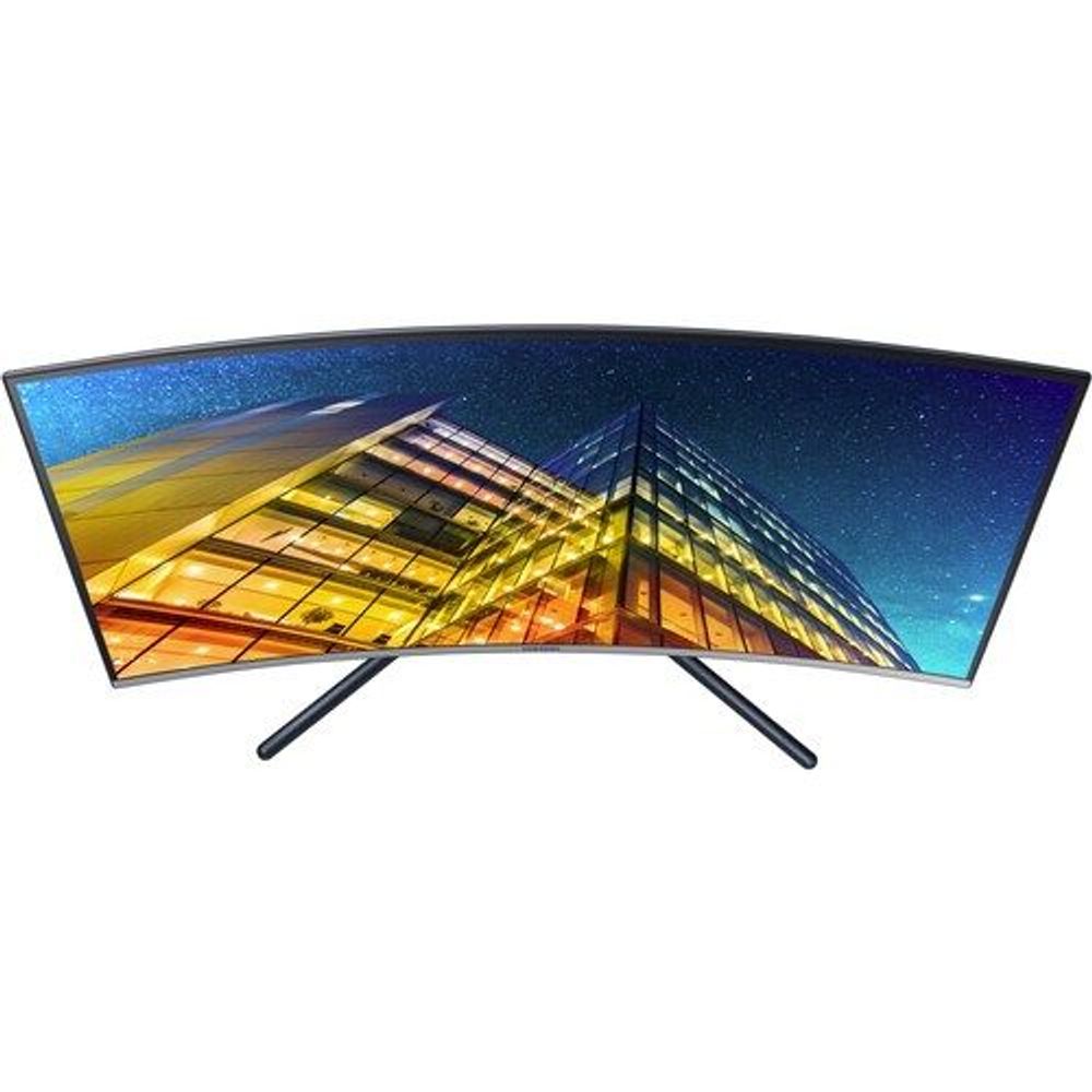 Samsung curved UHD LED monitor front view with vivid curved landscape wallpaper