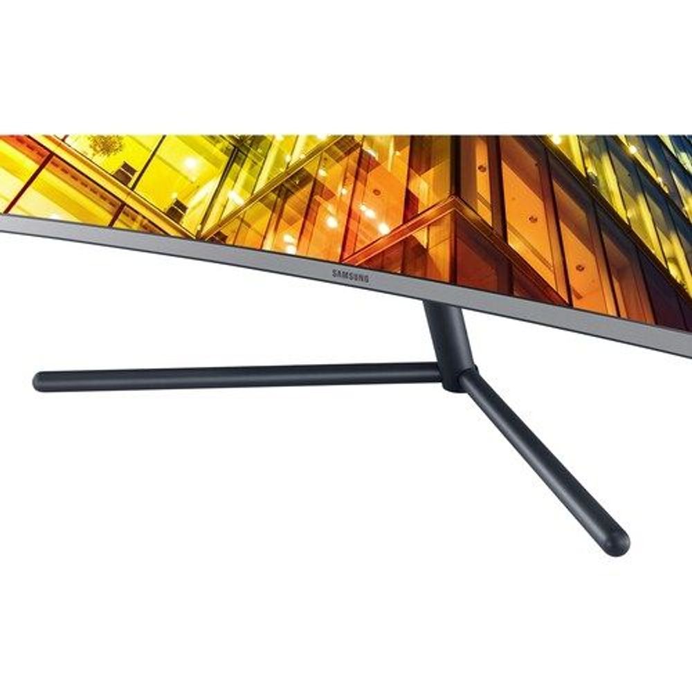 Curved monitor side view with dark stand and slim straight base bar