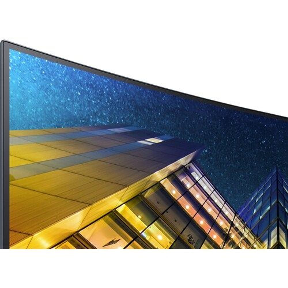 Curved LED monitor front view with dark bezel displaying vivid city scene