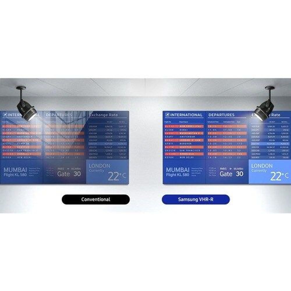 Digital signage display showing airport departure boards, Conventional and Samsung labels