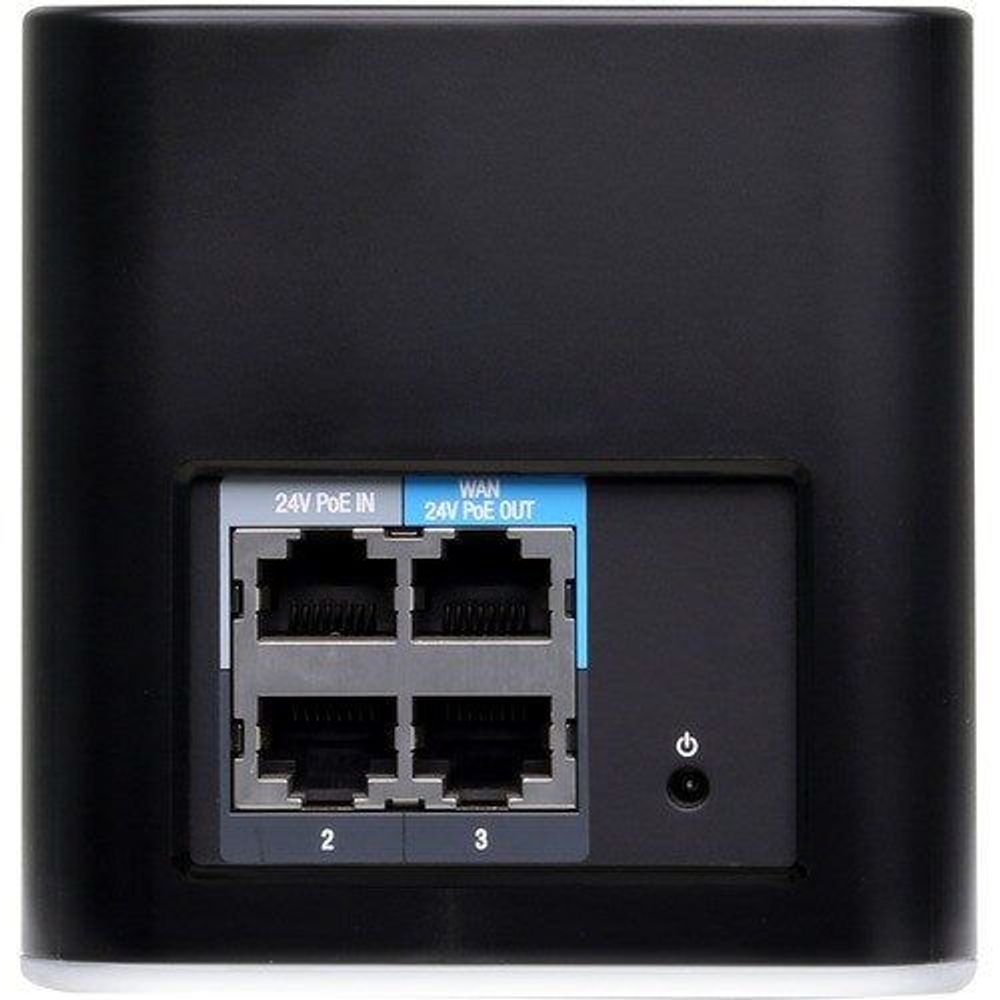 Ubiquiti airCube wireless access point rear panel with Ethernet ports and power button.