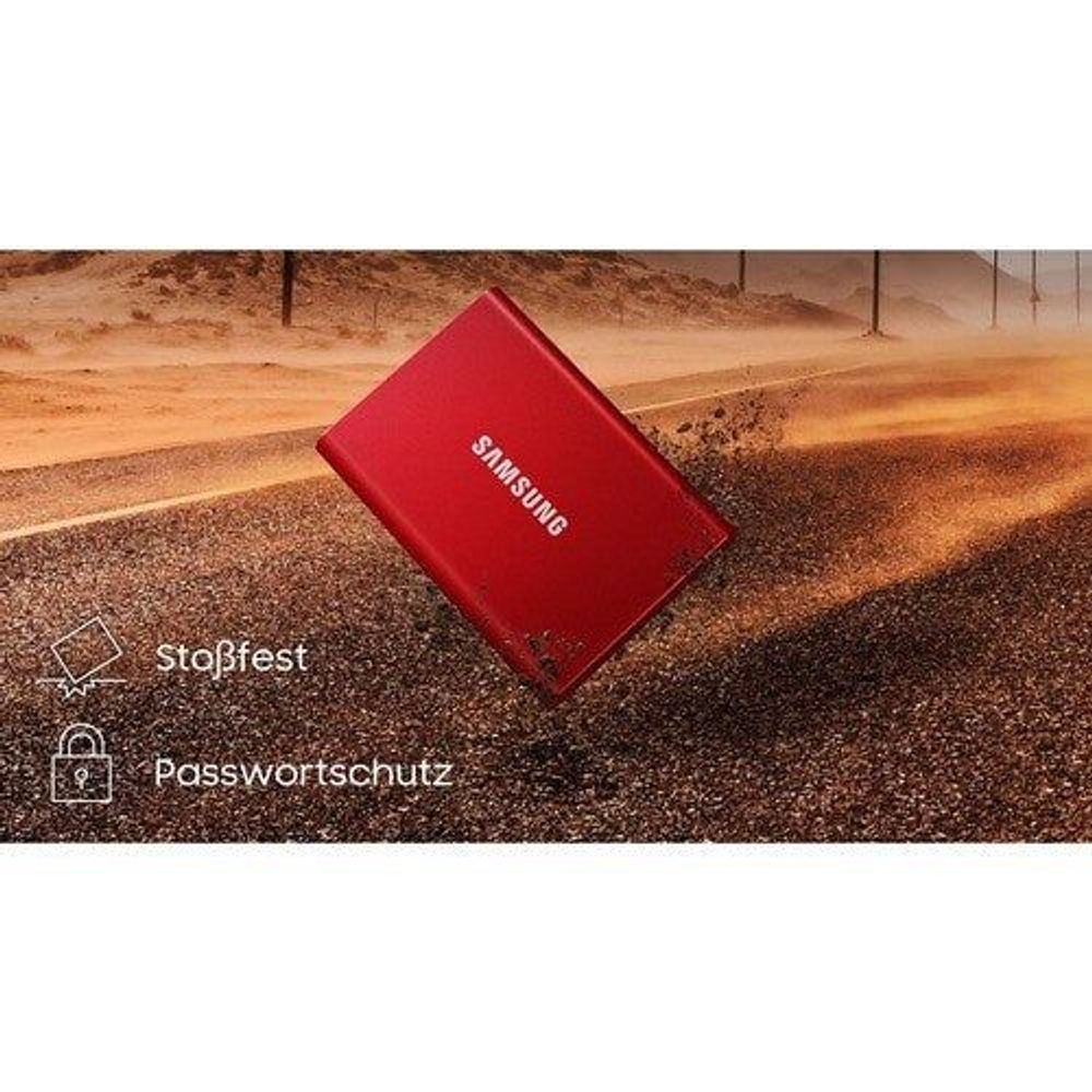 Red Samsung Portable SSD T7 with security icons on a rugged surface