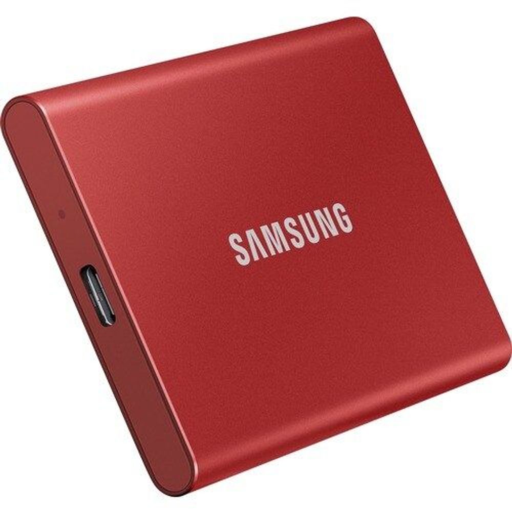Red Samsung Portable SSD T7 external solid state drive, showing side USB port