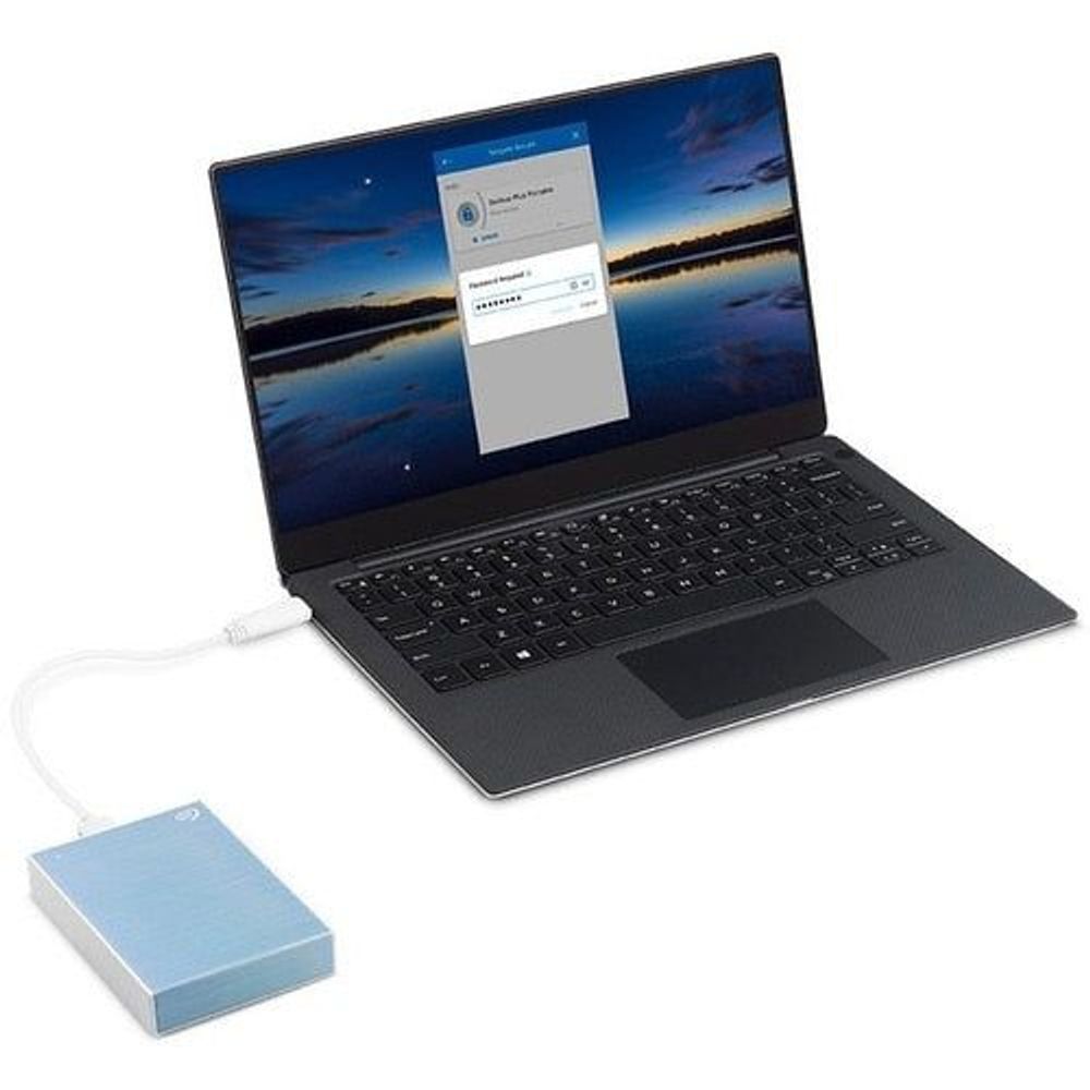 Light blue portable hard drive with USB cable, shown with laptop