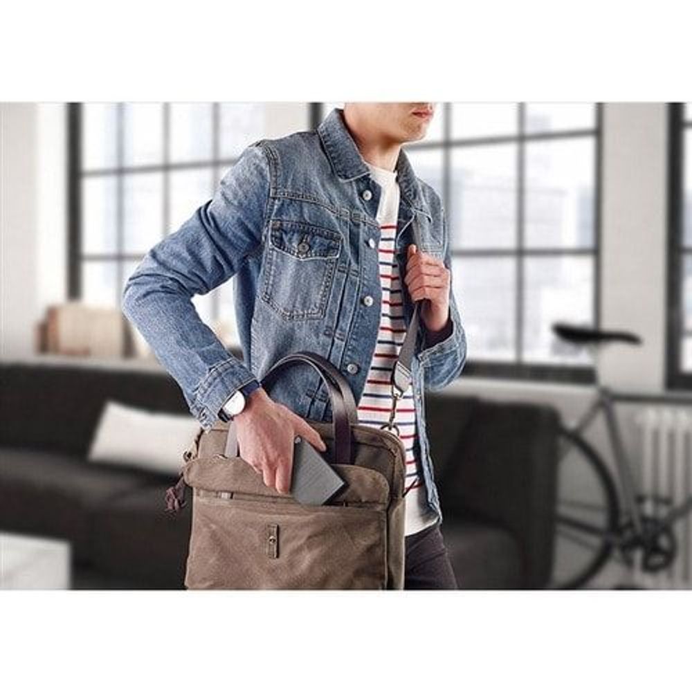 Portable external hard drive carried with a bag, compact gray rectangular case
