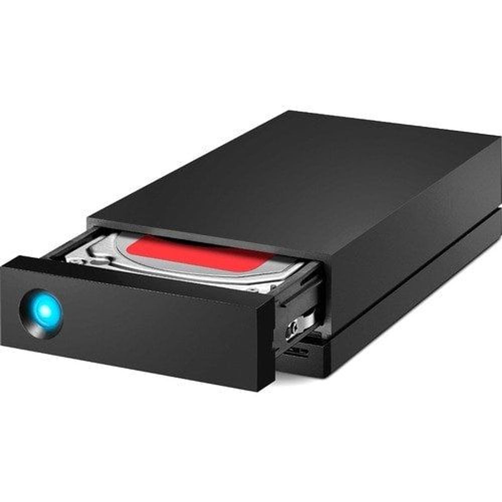 External desktop hard drive with blue LED and open drive bay showing red label