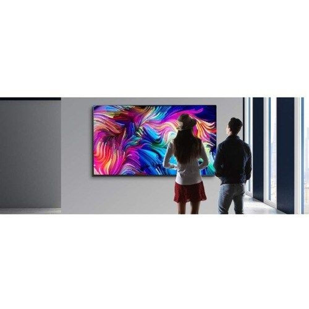 Digital signage display mounted on wall showing colorful abstract art