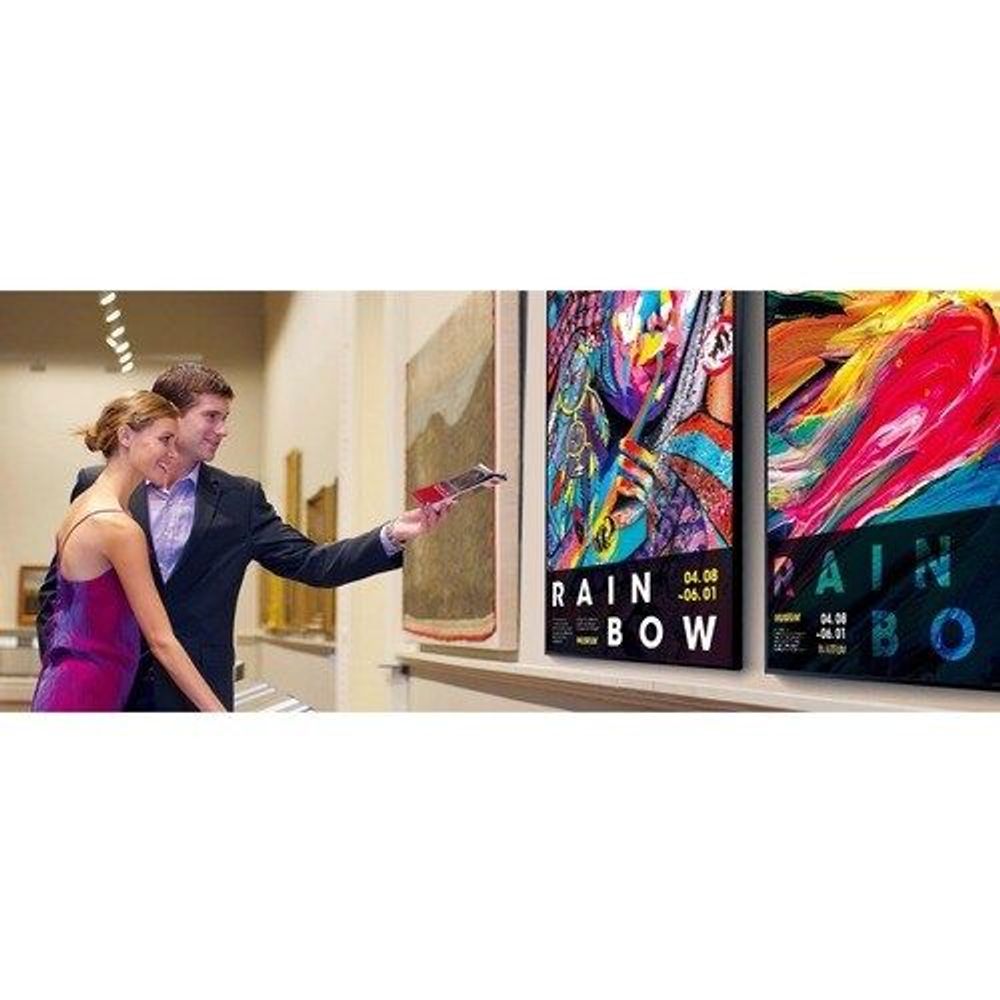 Digital signage display showing colorful poster-style content for public viewing