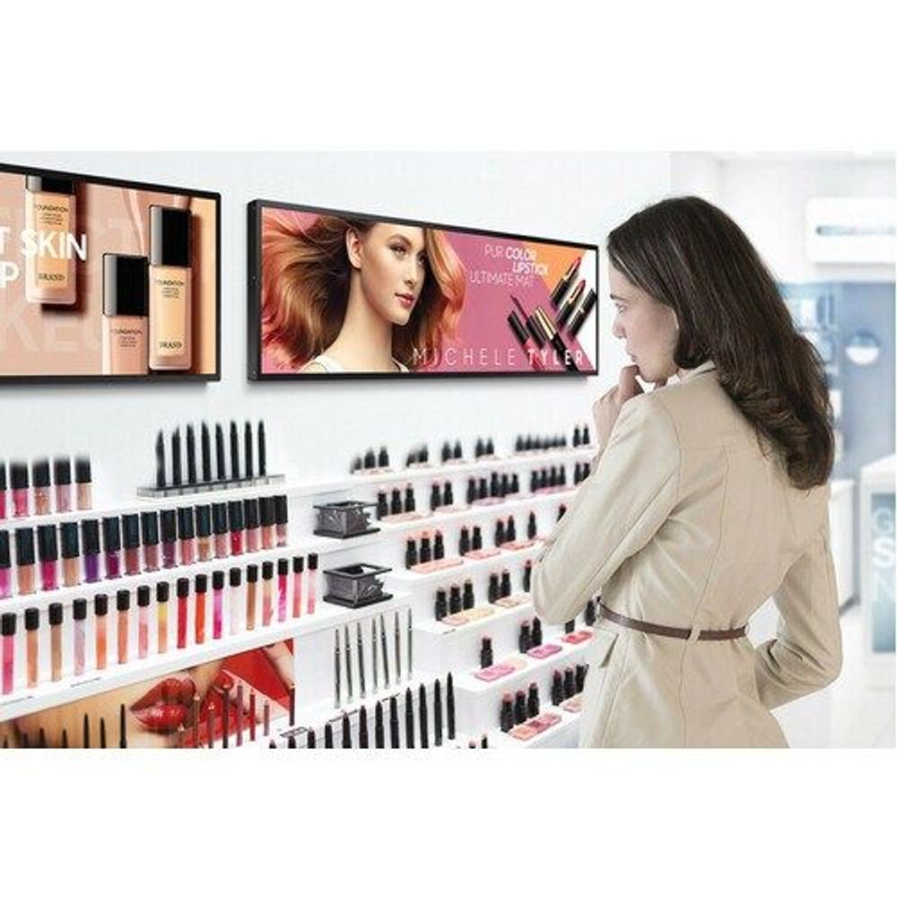 Samsung SHR-B stretch LCD display in a retail aisle with product ads on screen