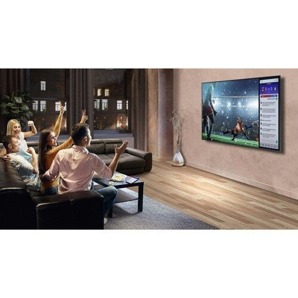 Black Samsung 75-inch Smart LED-LCD TV on wall, screen shows game scoreboard