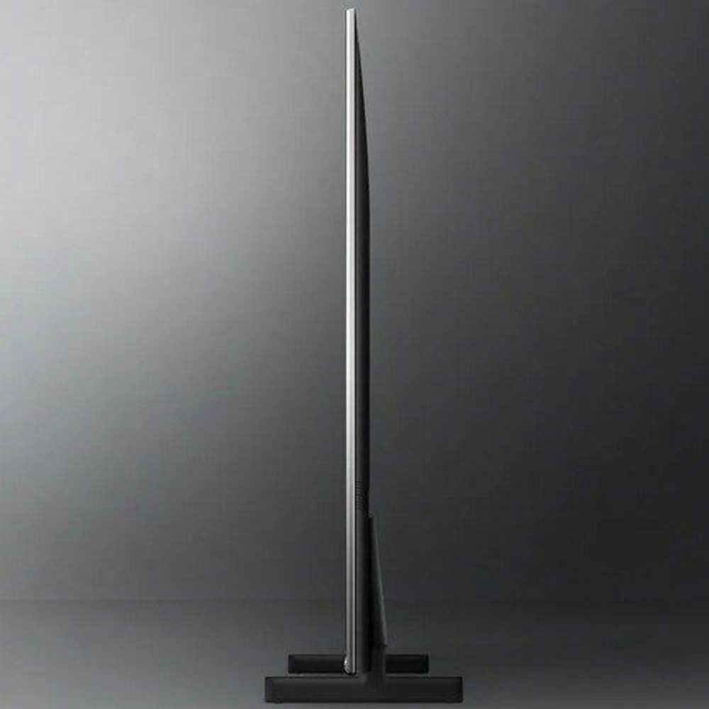 Slim black smart LED-LCD TV showing side profile with flat stand