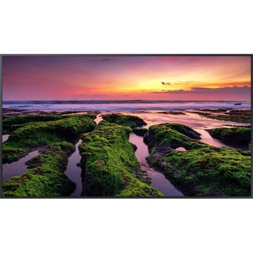 Black-bezel LCD digital signage display with scenic beach and sunset landscape