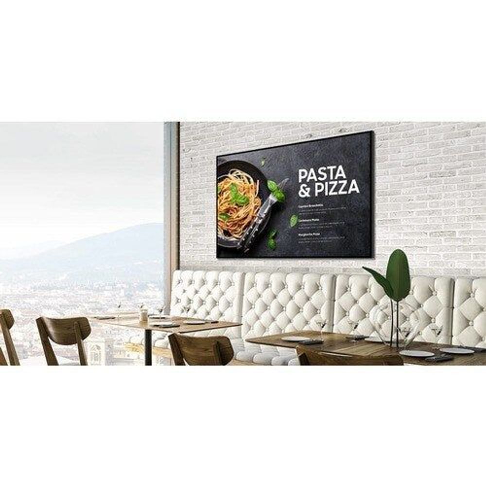 Samsung QB50B 50-inch LCD digital signage display, black bezel, showing Pasta & Pizza ad