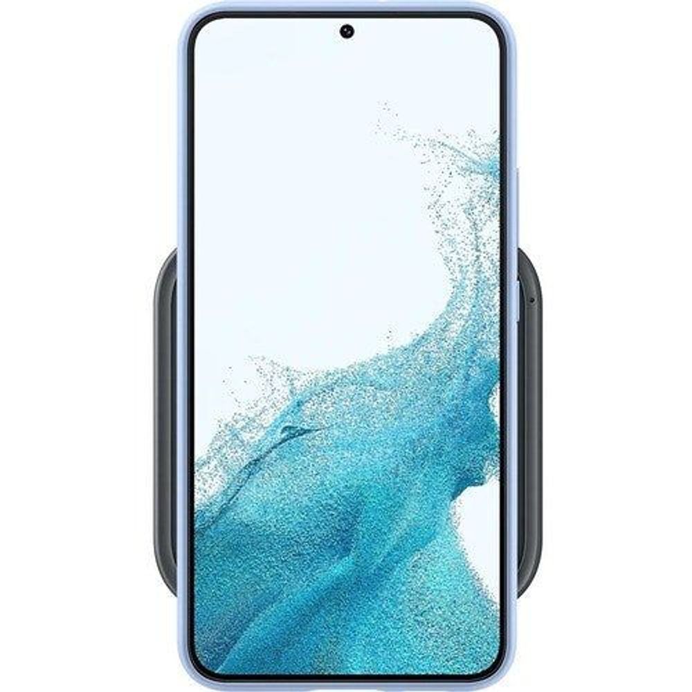 Samsung wireless charger with a smartphone placed on it, dark gray sides