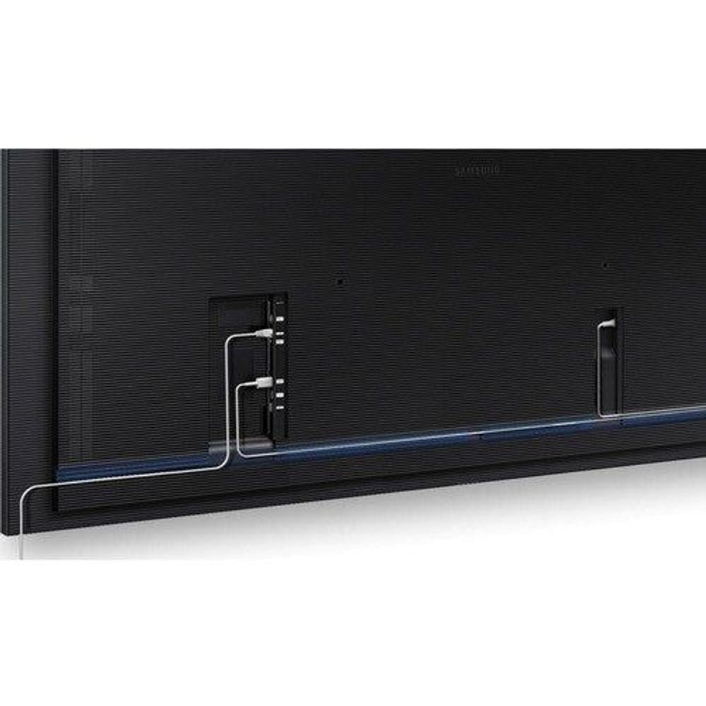 Lower edge of the black back of a Samsung 65-inch professional display showing cable ports