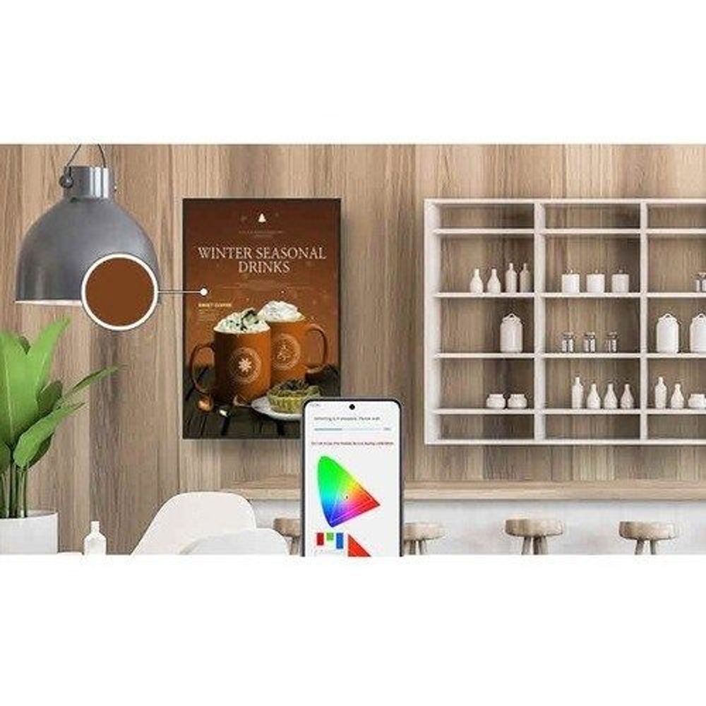 Samsung 65-inch professional LCD display showing drinks promotion on screen