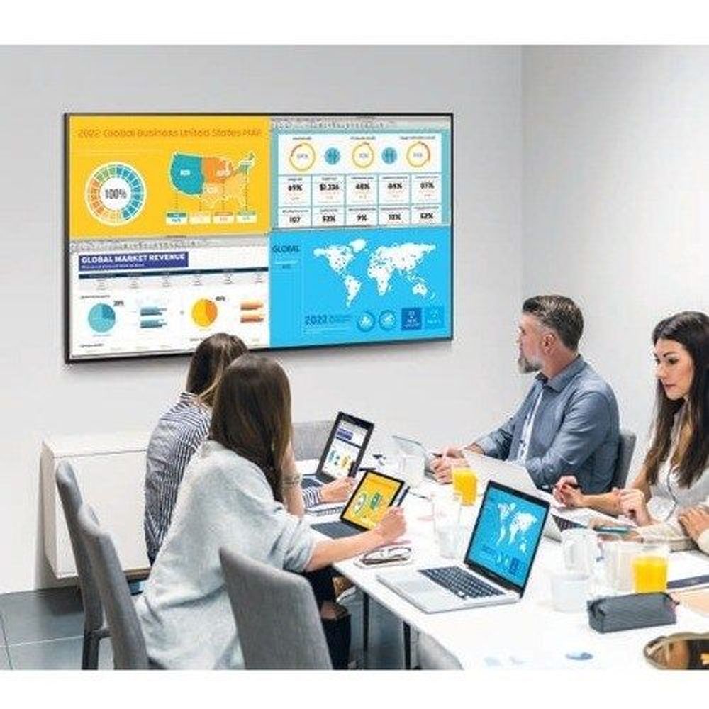 Samsung 65-inch professional LCD display showing world map presentation