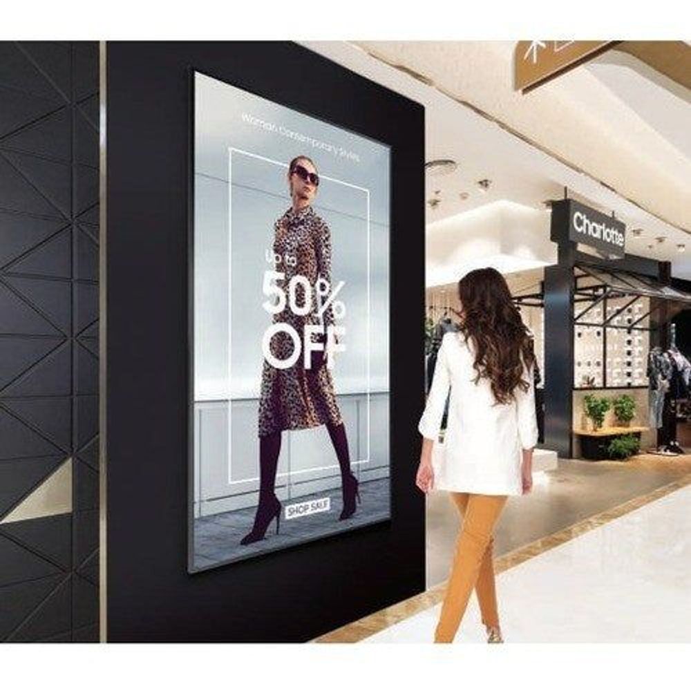 Samsung 65-inch professional display with a front ad screen and thin black bezel