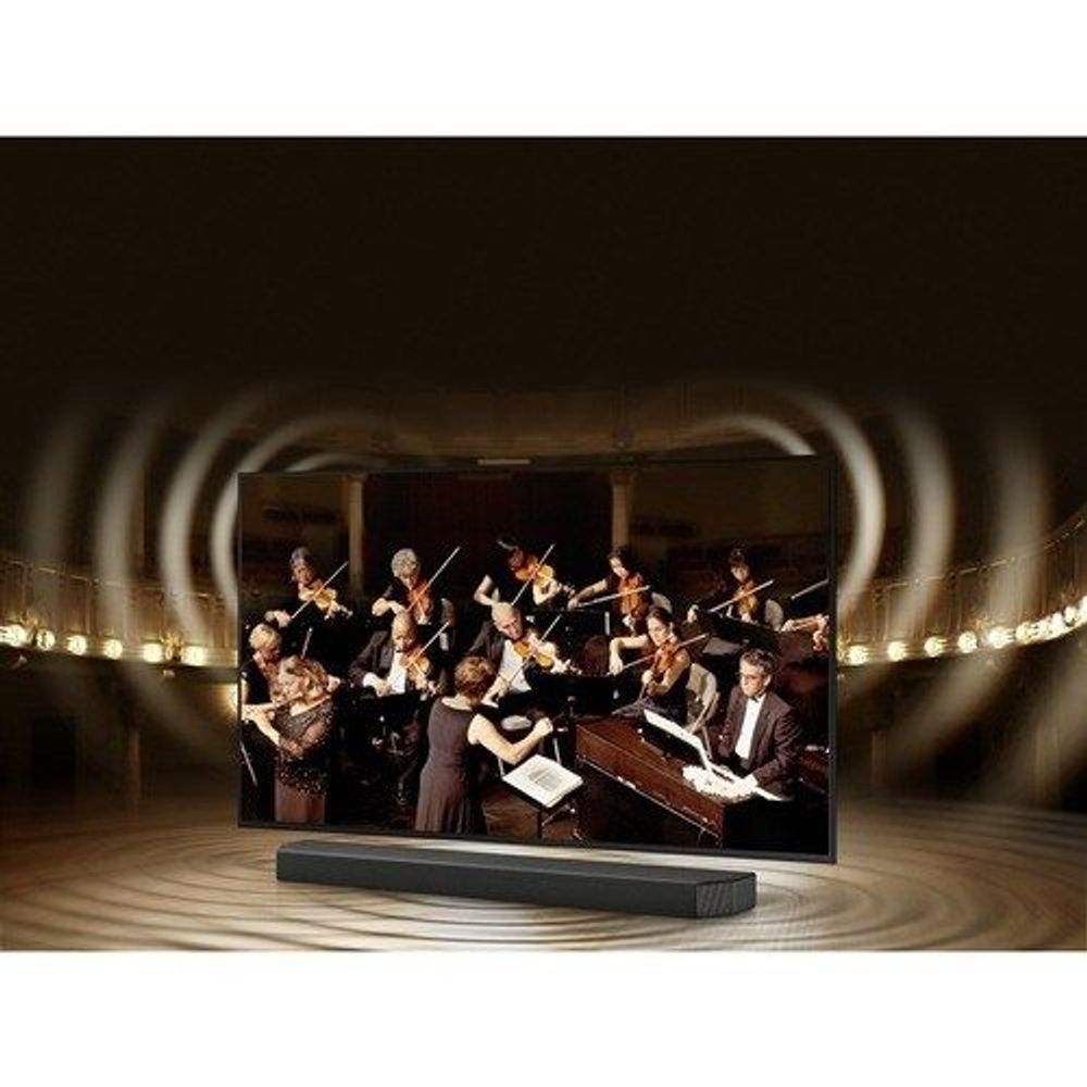 Samsung 50-inch smart LED-LCD TV on a soundstage, showing a live orchestra performance.