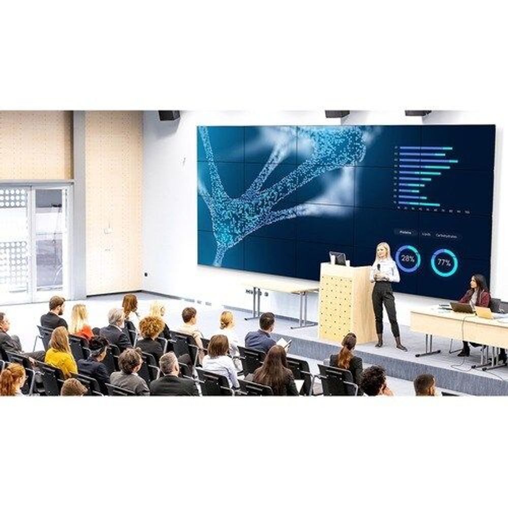 46-inch digital signage LCD display mounted in classroom with presentation slide