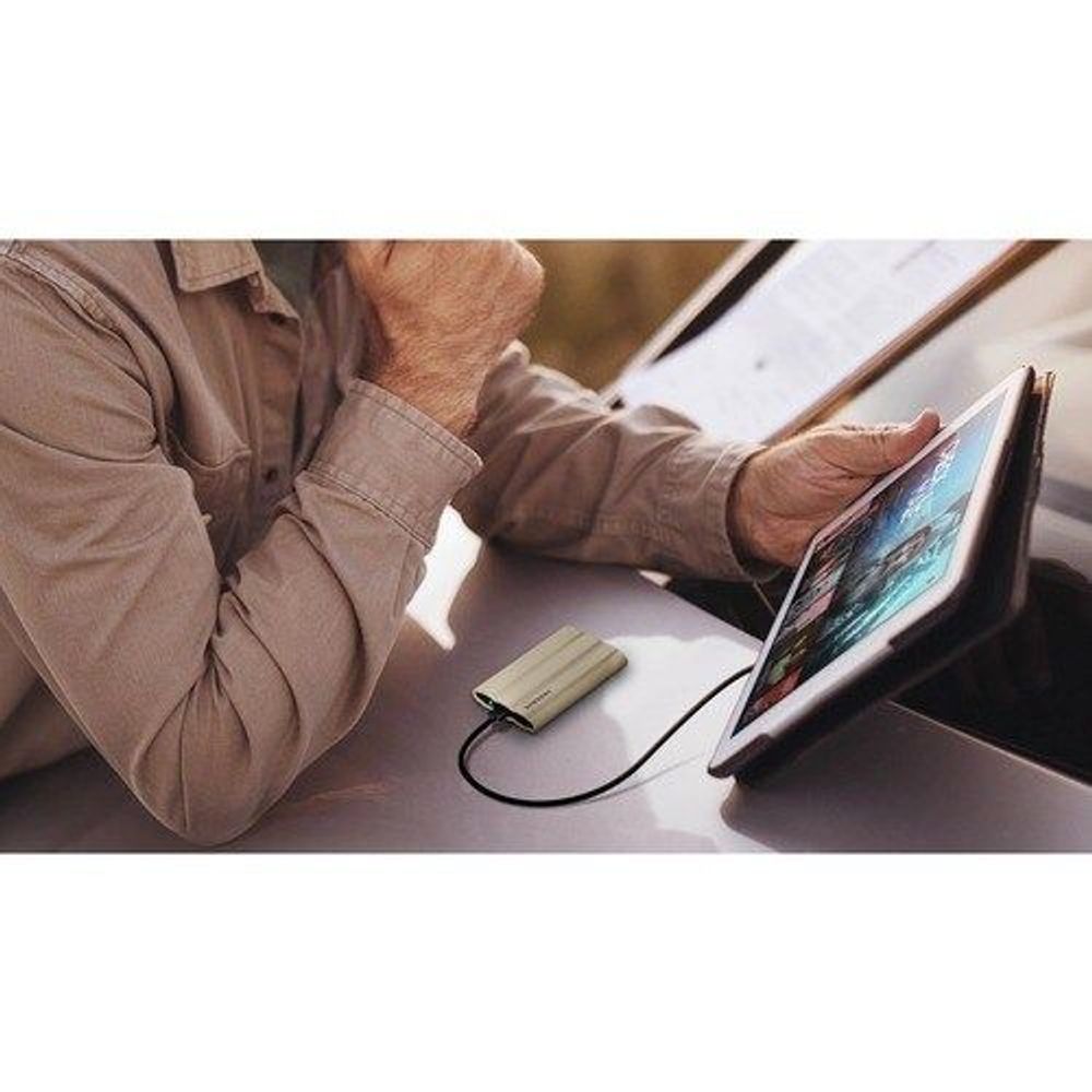 Rugged Samsung Portable SSD connected to a laptop in use