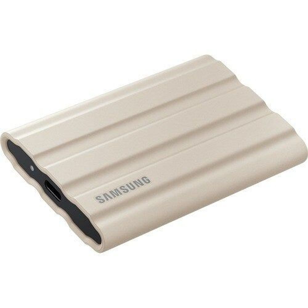 Beige rugged portable SSD with black side ports and Samsung logo.