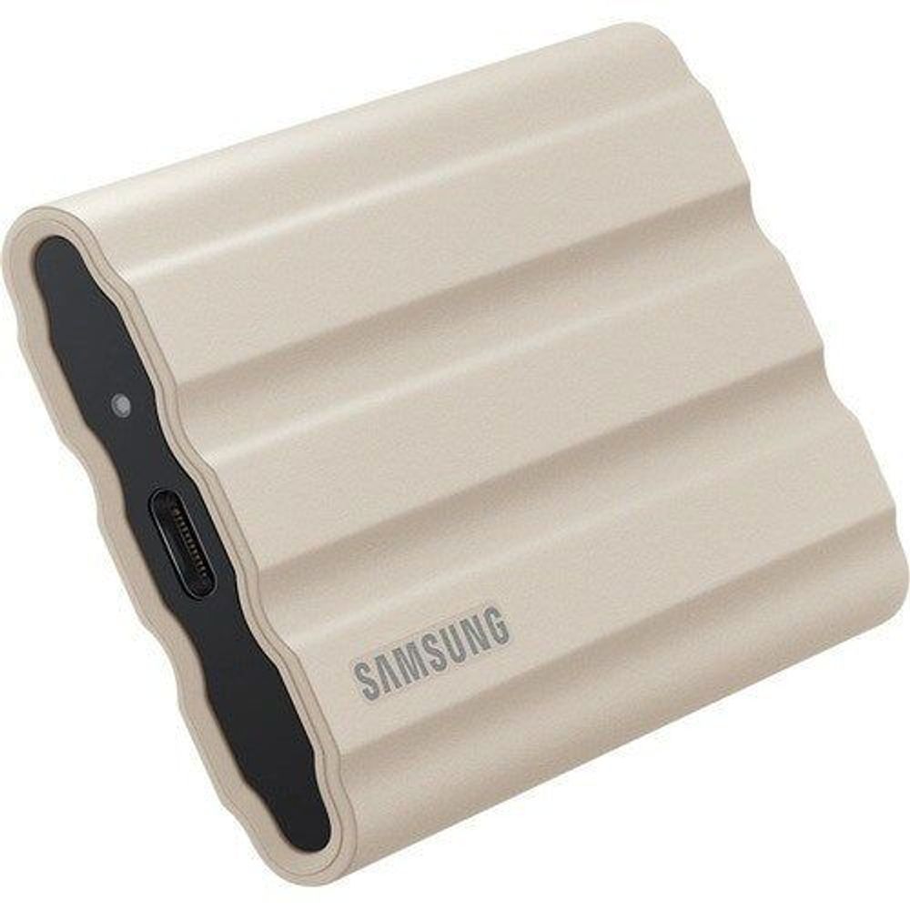 Beige Samsung rugged portable SSD with dark side trim and port openings