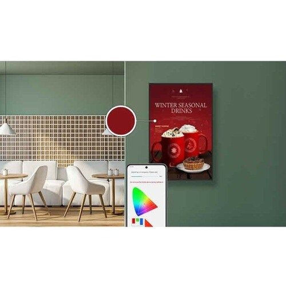 Samsung 50-inch QHB professional display showing winter drinks ad and colorful screen
