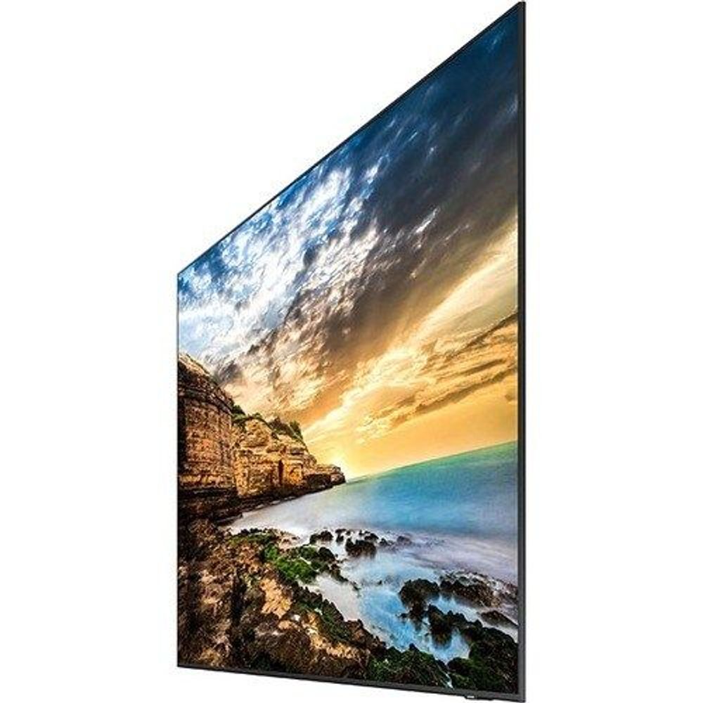 Digital signage display angled view showing coastal landscape image