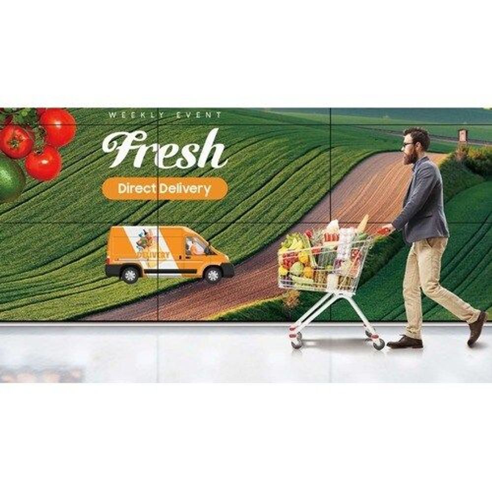 55-inch LCD digital signage display showing Fresh delivery farm promo