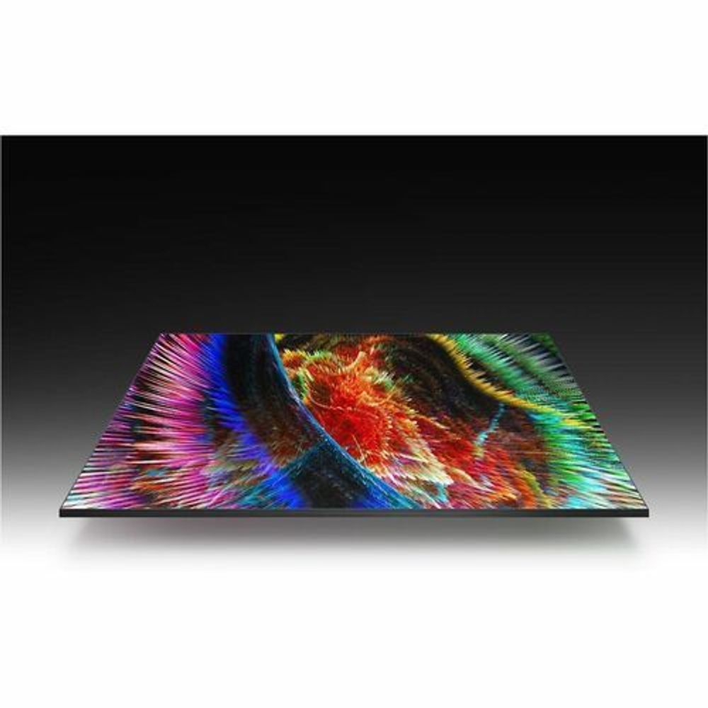 Digital signage display showing vibrant rainbow textured abstract graphic on the screen