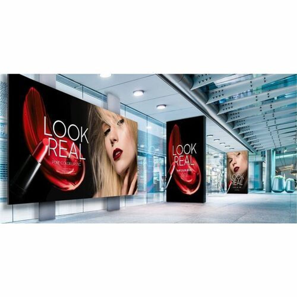 Digital signage LCD screen set in hallway, showing promotional graphics