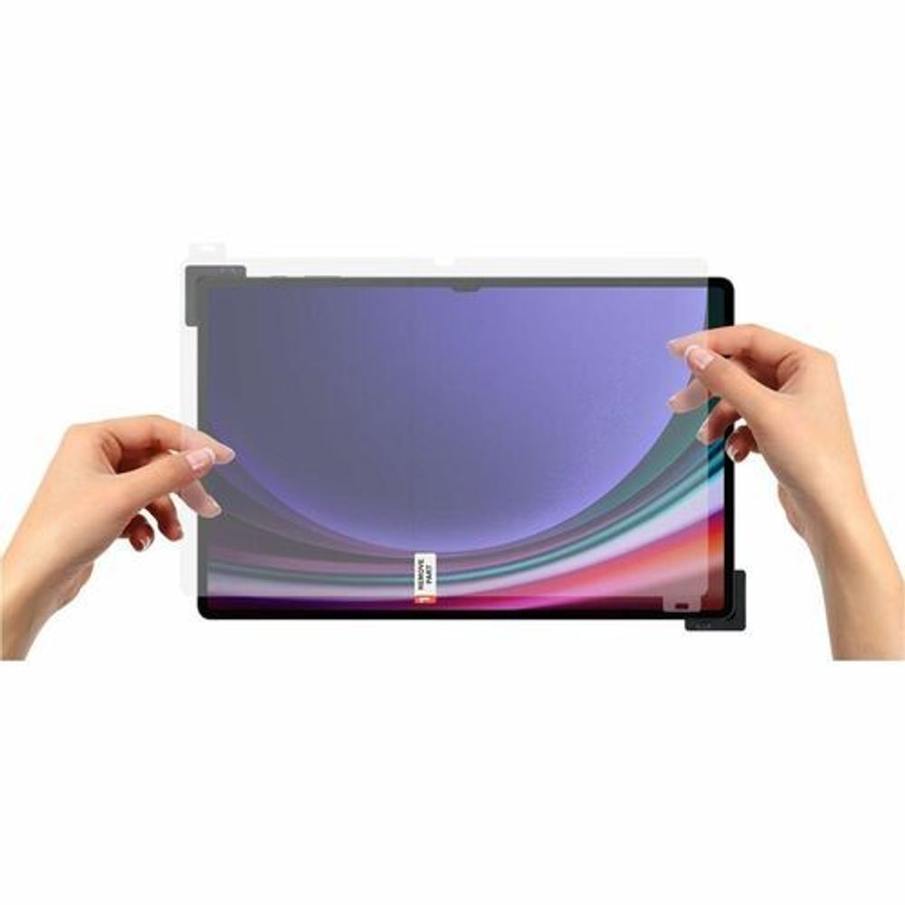 Anti-reflecting screen protector film being applied to tablet screen by two hands